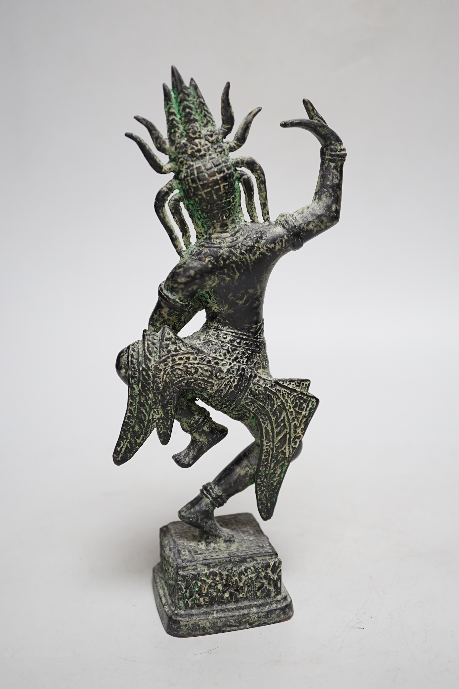 A Khmer style bronze figure of a deity, 24cm high